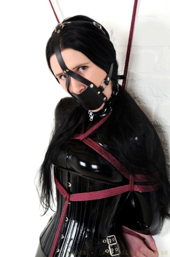 Free porn pics of Amélie bound and gagged in latex catsuit 1 of 55 pics