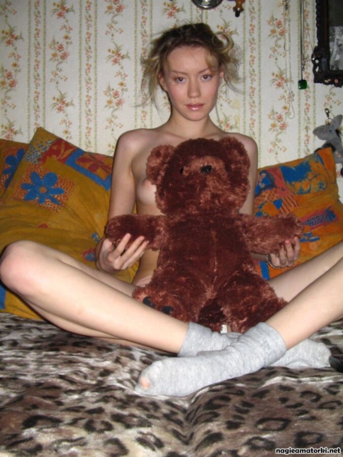 Free porn pics of Hot teen girl striptease with plush teddy bear 14 of 18 pics