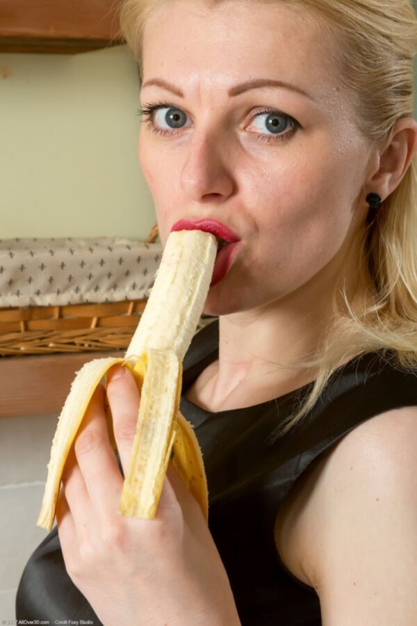 Free porn pics of Mature blond Sasha enjoys a banana. 10 of 177 pics