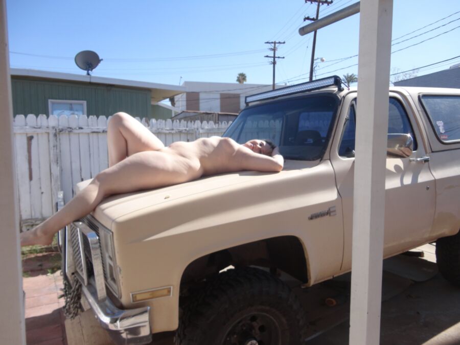 Free porn pics of Pudgy blonde poses with her truck. 3 of 6 pics