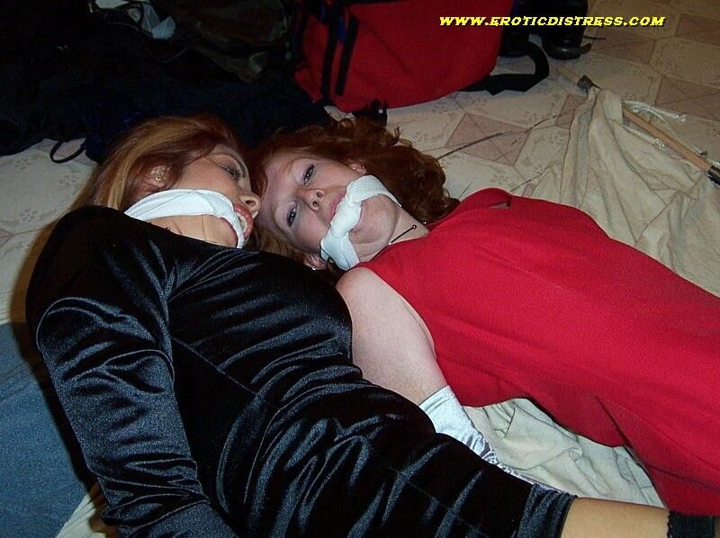 Free porn pics of Kelly Kole roped on the floor with a friend 13 of 13 pics