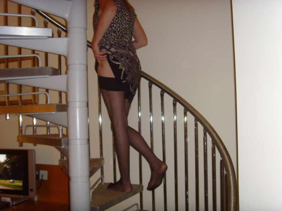 Free porn pics of MY MILF TEASES by removing her thong and going up the stairs. 2 of 6 pics