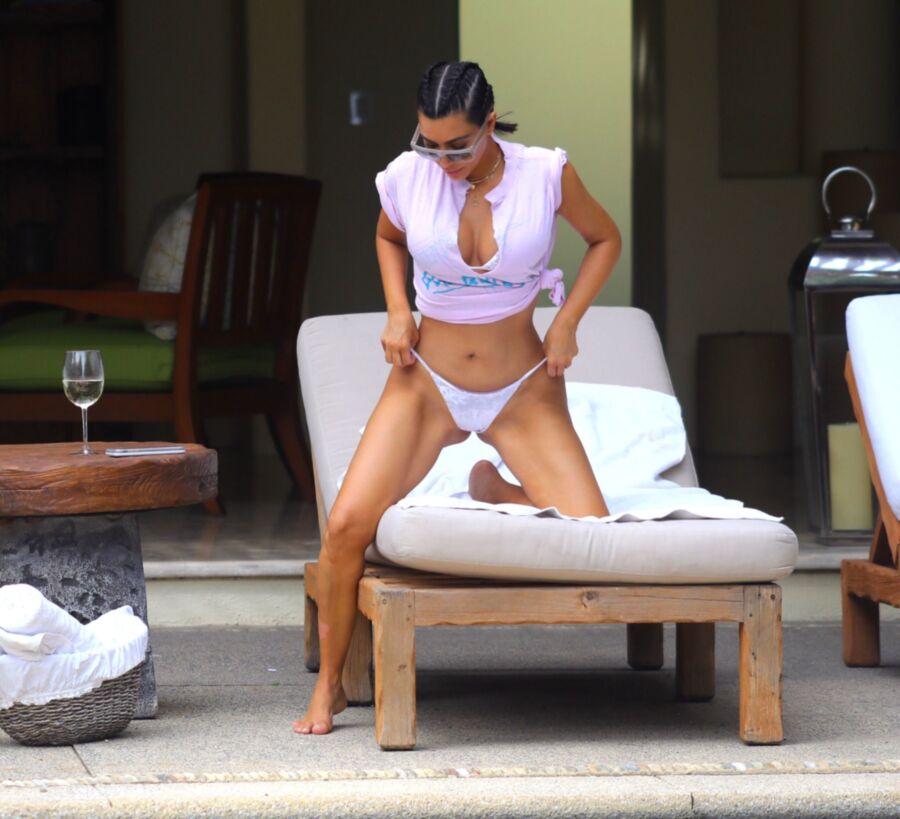 Free porn pics of Kim Kardashian & Kourtney Kardashian in bikini 3 of 14 pics