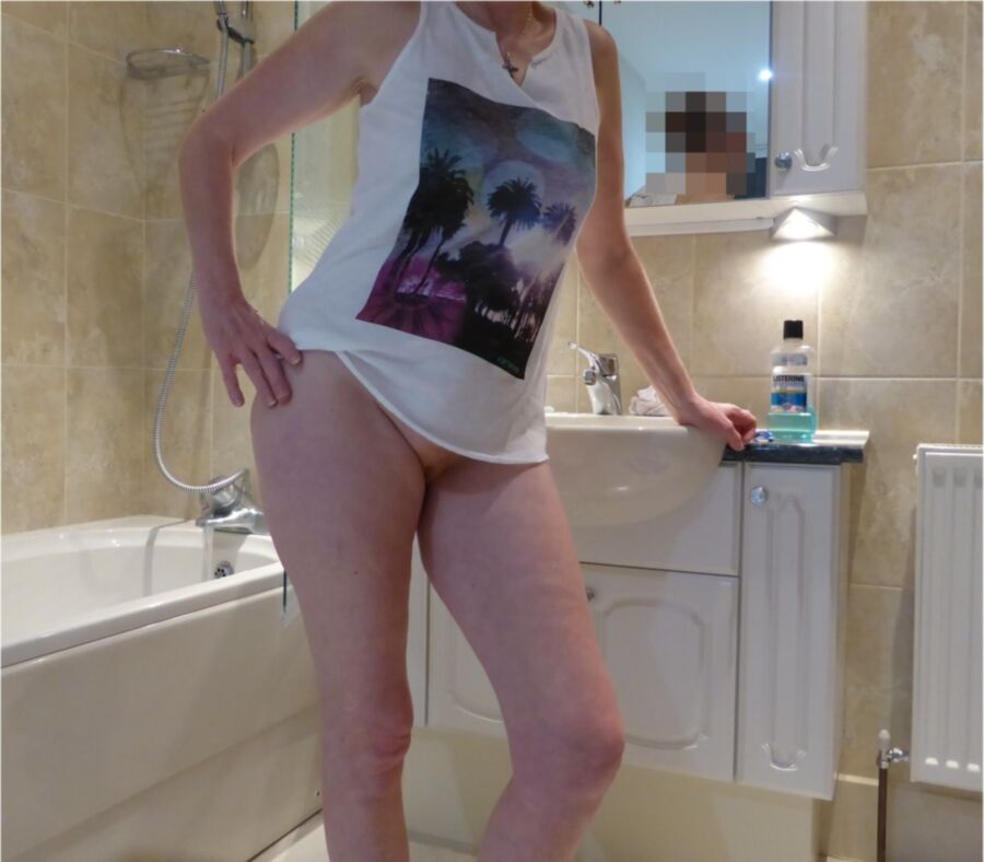 Free porn pics of MY MILF takes BATHROOM selfies in a T SHIRT. 1 of 5 pics