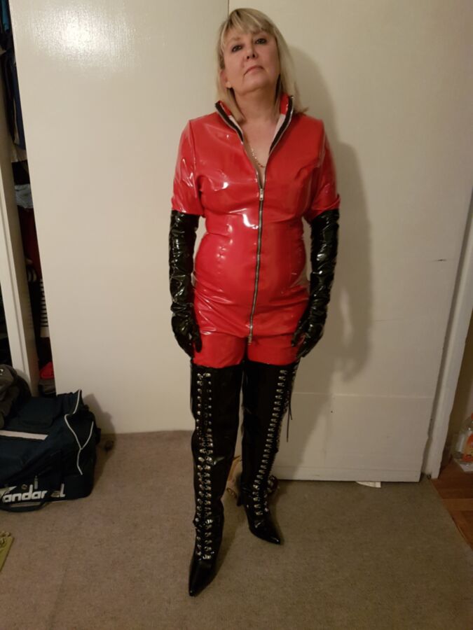 Free porn pics of Red Catsuit & Thighboots 3 of 9 pics