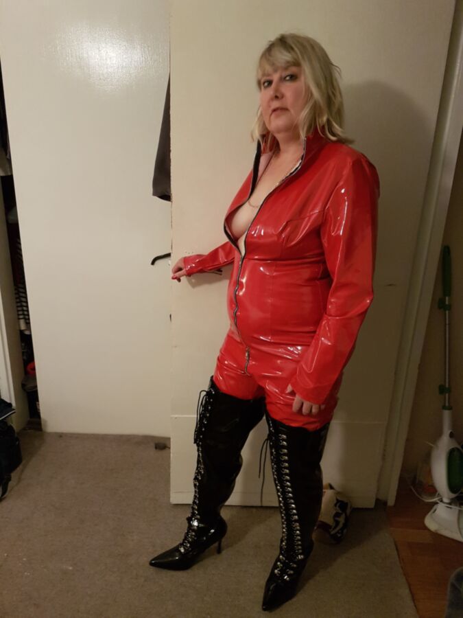 Free porn pics of Red Catsuit & Thighboots 2 of 9 pics