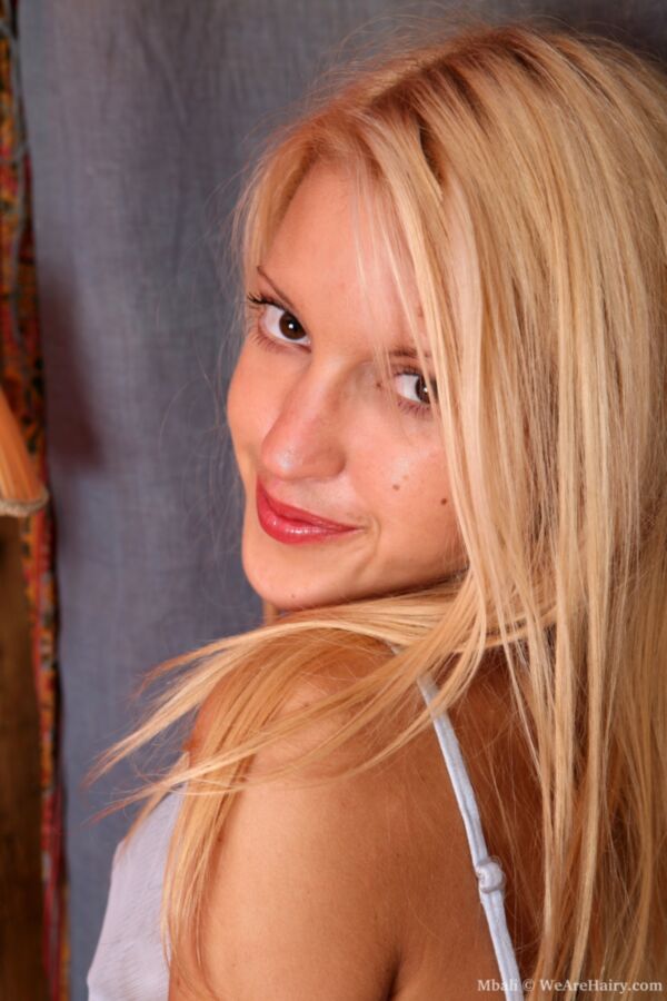 Shaved and pierced lesbian slave
