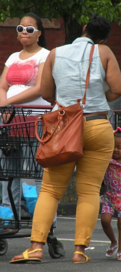 Free porn pics of Yummy black woman in tight pants, dimply legs SEXY 5 of 5 pics