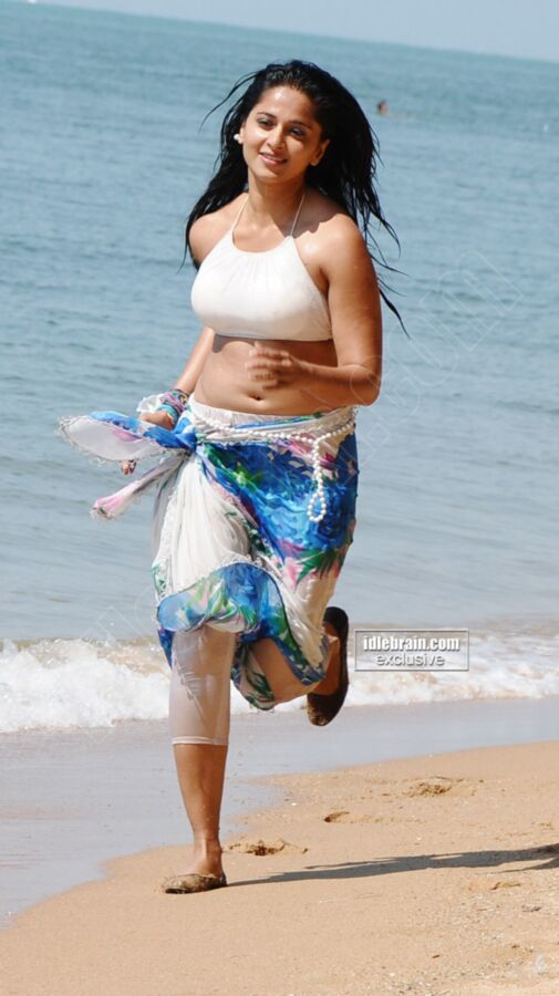 Free porn pics of Anushka Shetty Steamy, Sexy Beach Pics, showing her Hot Navel 1 of 120 pics