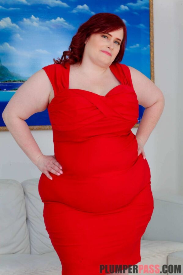 Free porn pics of Asstyn Martyn - red dress on the couch 5 of 237 pics