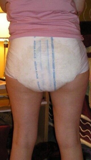 Free porn pics of Men and Women in diapers 11 of 17 pics