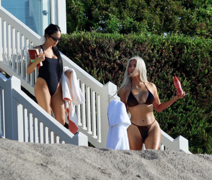 Free porn pics of Kim Kardashian in a thong-bikini @ the beach 9 of 11 pics