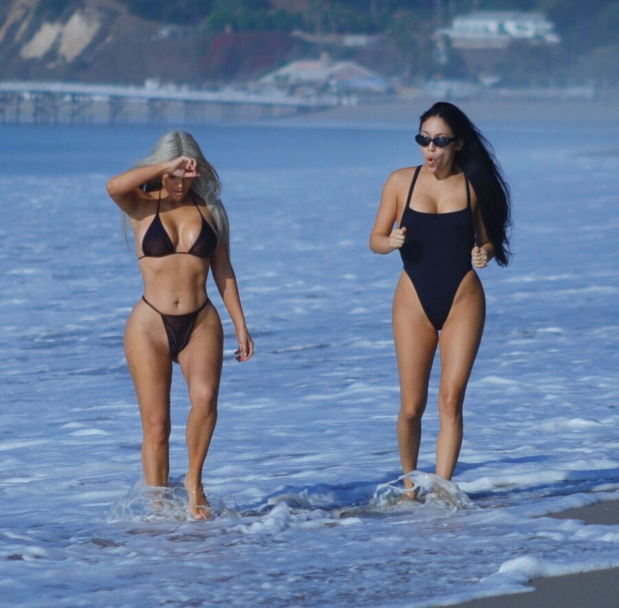 Free porn pics of Kim Kardashian in a thong-bikini @ the beach 11 of 11 pics