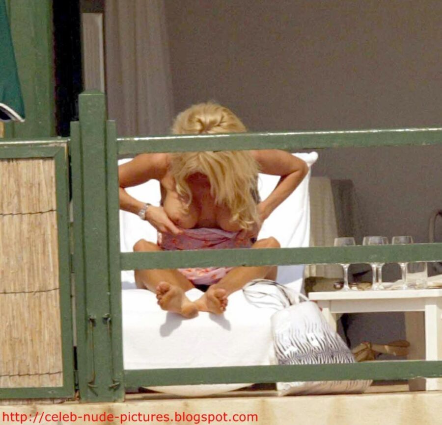 Free porn pics of Victoria Silvstedt topless sunbathing 9 of 13 pics