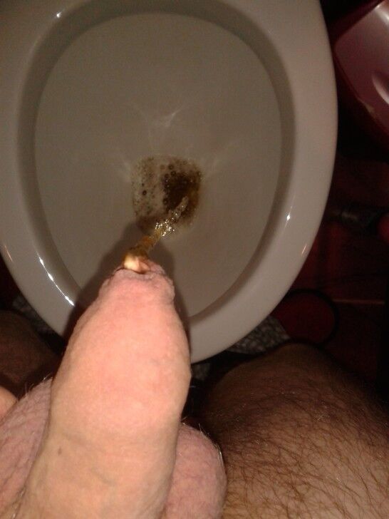 Free porn pics of Me pissing in toilet 7 of 8 pics
