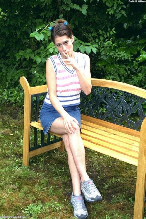 Free porn pics of Carmen smoking on bench 4 of 72 pics