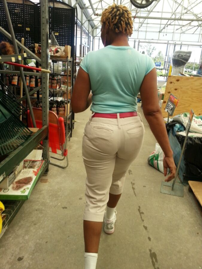 Free porn pics of Candid booty gilf that works at walmart. 3 of 6 pics