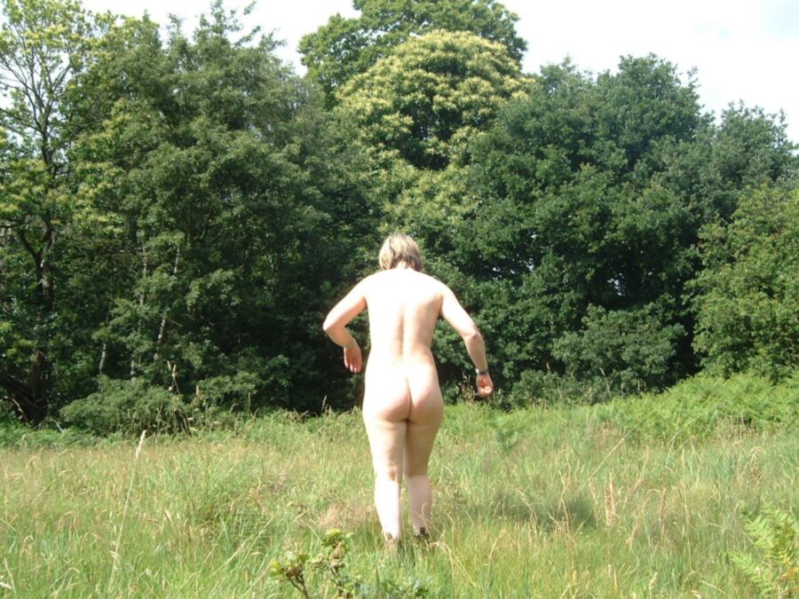 Free porn pics of Naturist wife outside in the field 7 of 8 pics