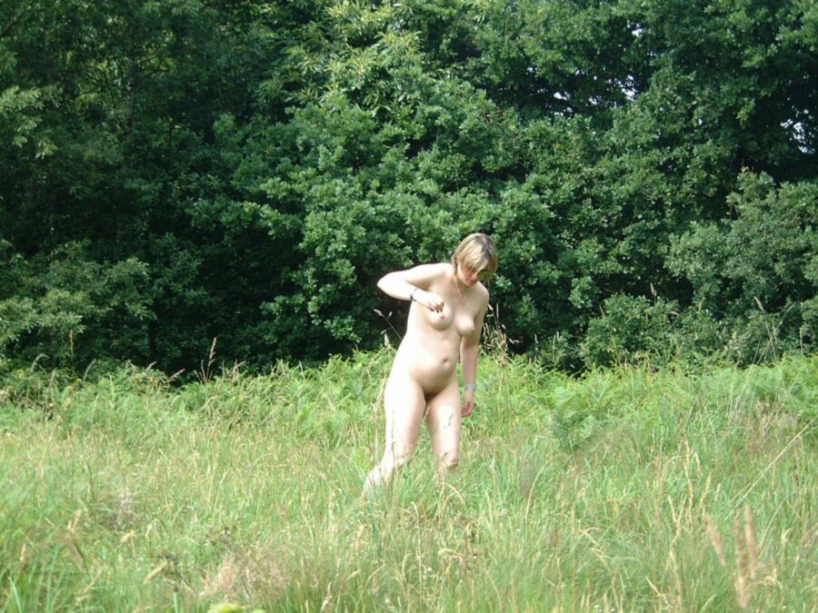 Free porn pics of Naturist wife outside in the field 6 of 8 pics