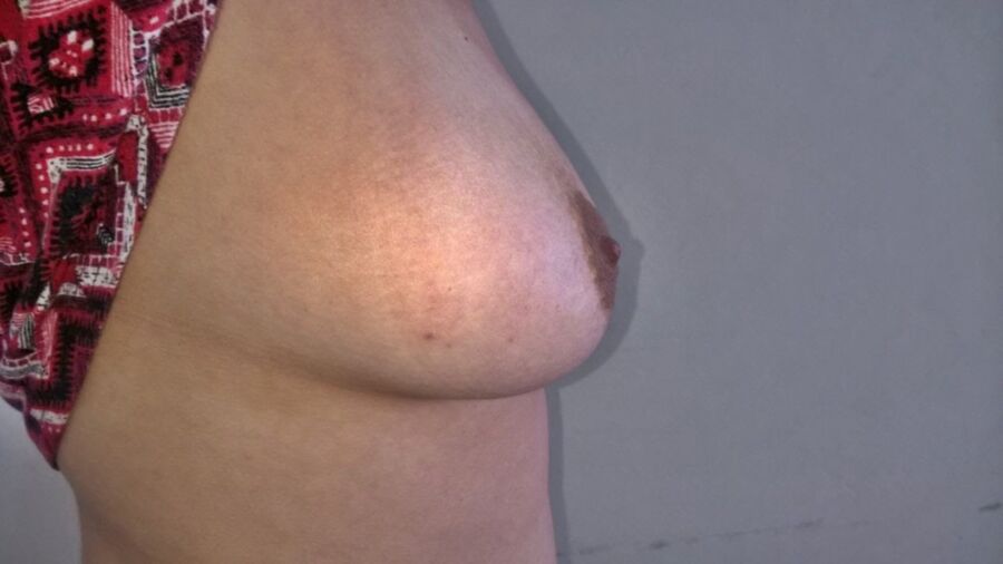 Free porn pics of Latina milf showing tits 14 of 14 pics