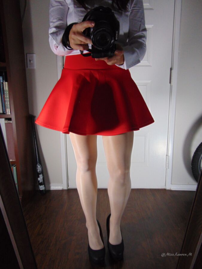 Free porn pics of Miss Lauren in a red skirt showing her feet in white stockings 1 of 26 pics