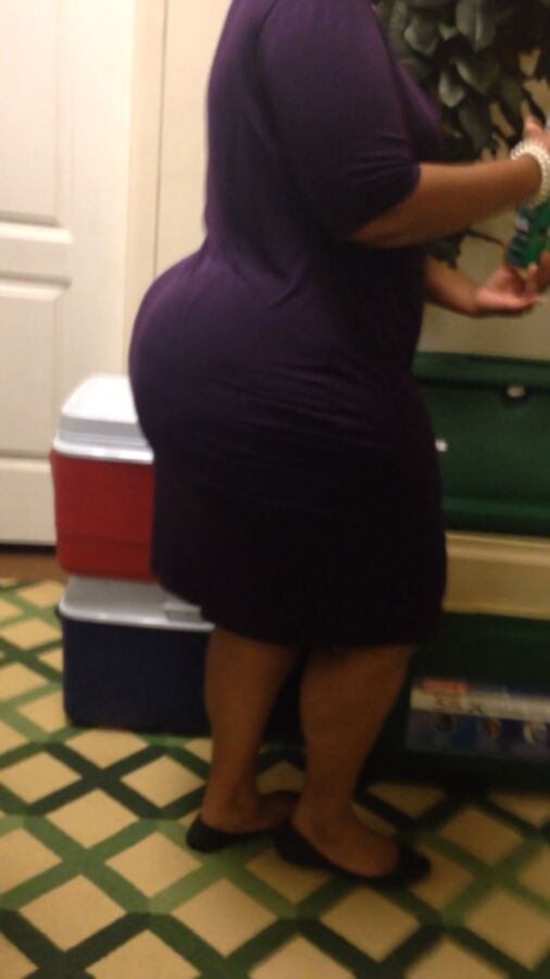 Free porn pics of Enormous BBW Ebony Ass in Purple Dress 14 of 29 pics