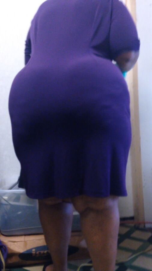 Free porn pics of Enormous BBW Ebony Ass in Purple Dress 24 of 29 pics