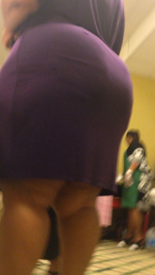 Free porn pics of Enormous BBW Ebony Ass in Purple Dress 10 of 29 pics