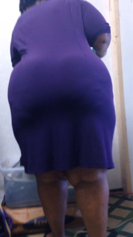 Free porn pics of Enormous BBW Ebony Ass in Purple Dress 18 of 29 pics