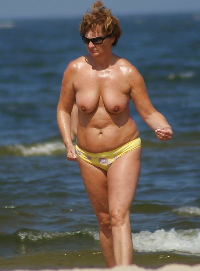 Free porn pics of mature topless beach 9 of 26 pics