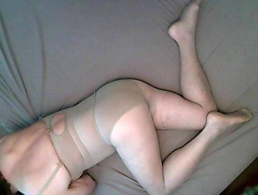 Free porn pics of Sissy in pantyhose, corset, butt plug, nipple-cutout bra 6 of 24 pics