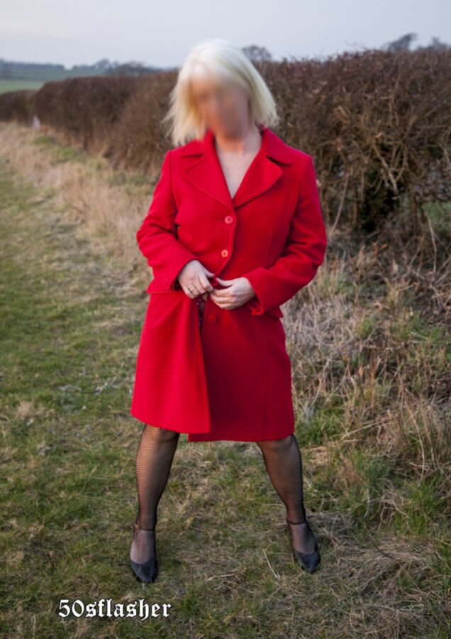 Free porn pics of Red Coat and fishnet stockings  12 of 16 pics
