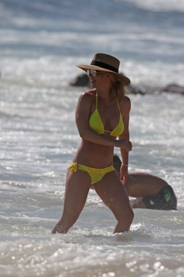 Free porn pics of Britney Spears - Yellow Bikini Candids 2 of 17 pics