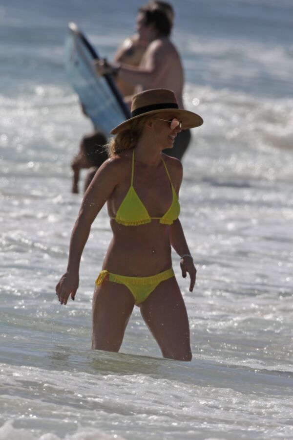 Free porn pics of Britney Spears - Yellow Bikini Candids 1 of 17 pics