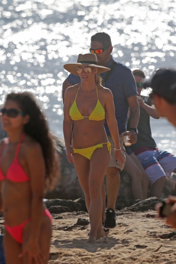 Free porn pics of Britney Spears - Yellow Bikini Candids 11 of 17 pics