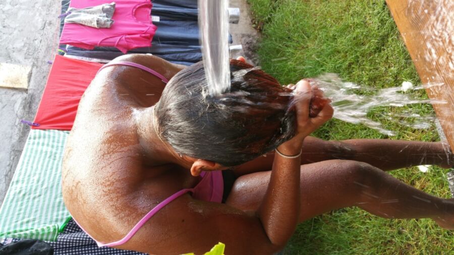 Free porn pics of My black slut showering outdoor 7 of 12 pics