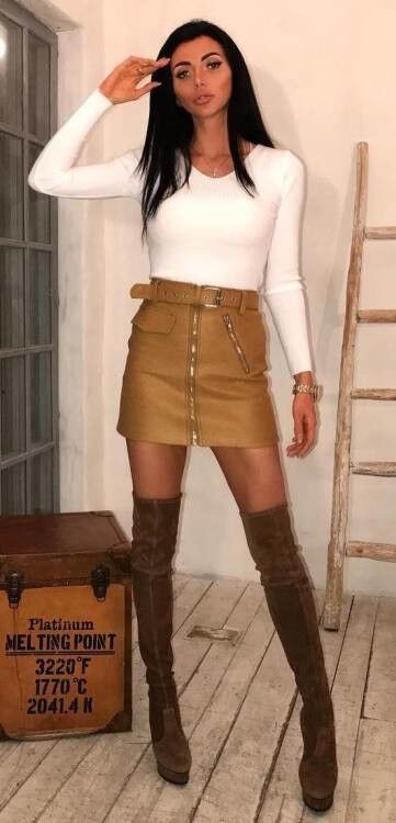 Free porn pics of girls in otk boots and leather skirt 12 of 20 pics