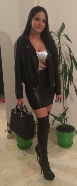 Free porn pics of girls in otk boots and leather skirt 9 of 20 pics