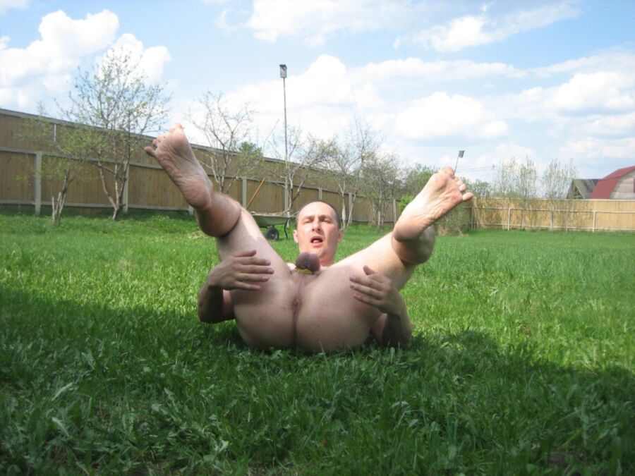 Free porn pics of Russian gay slut lying on the grass 4 of 11 pics