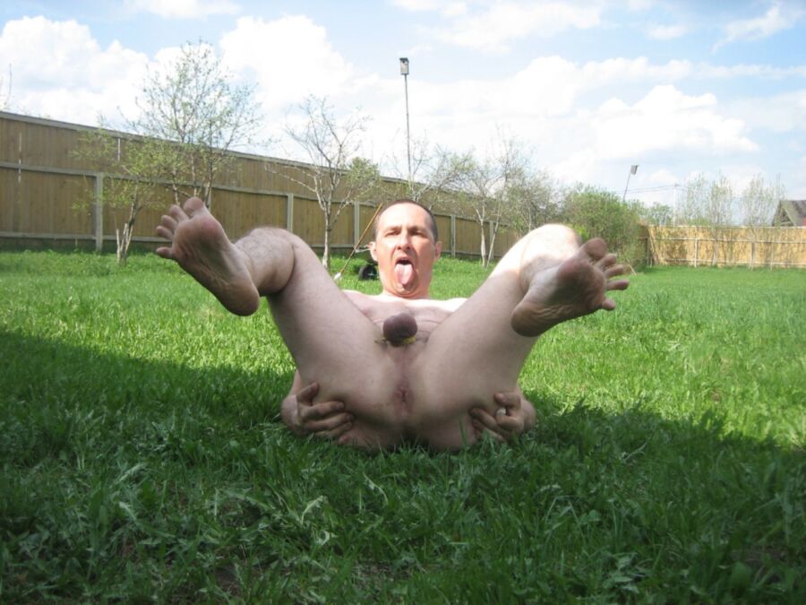 Free porn pics of Russian gay slut lying on the grass 10 of 11 pics