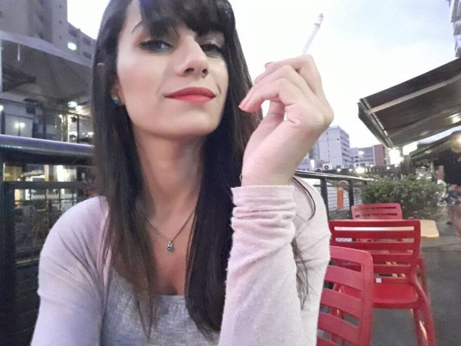 Free porn pics of Sixty-four brunettes smoking cigarettes. 4 of 64 pics