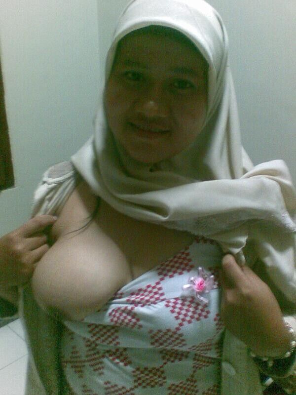 Free porn pics of indonesian hijab girl showing boobs 1 of 4 pics