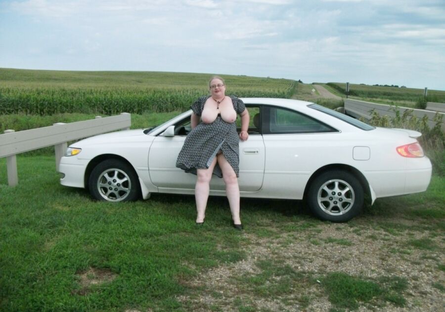 Free porn pics of BBW Val likes to get naked with her car 19 of 21 pics