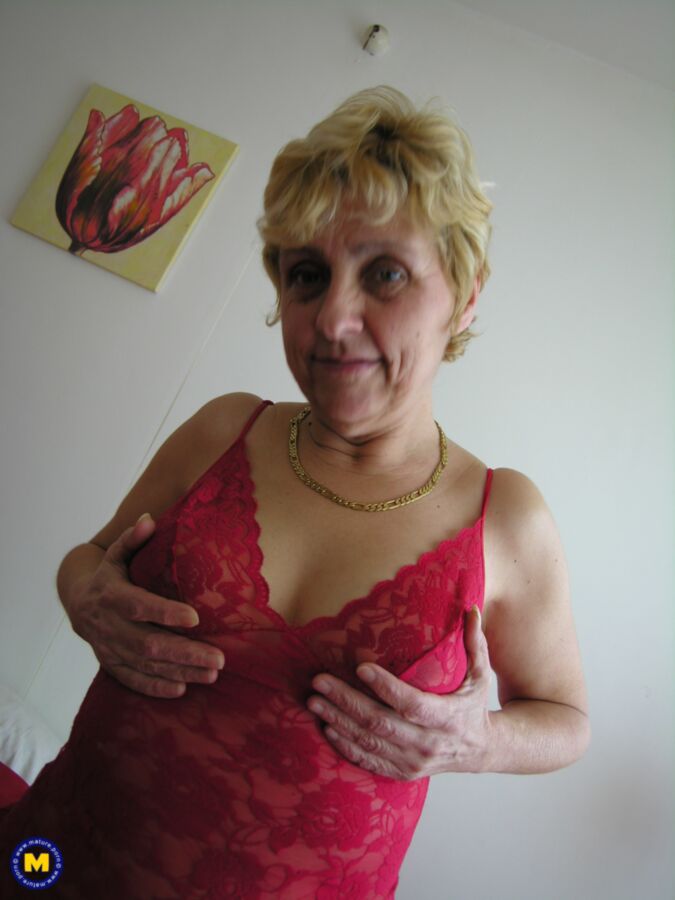 Free porn pics of Blond granny Karina pleasures herself. 9 of 53 pics