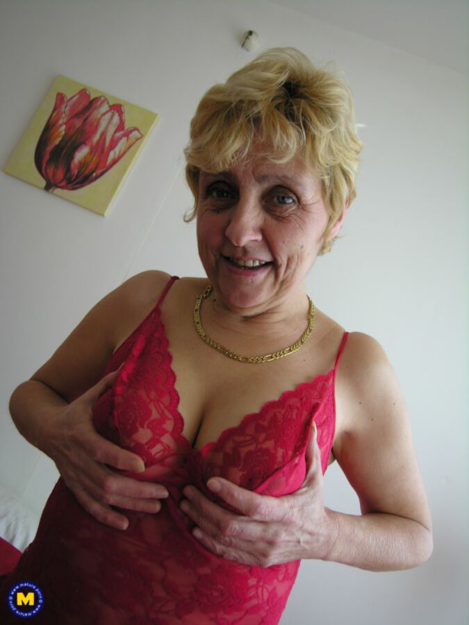 Free porn pics of Blond granny Karina pleasures herself. 10 of 53 pics