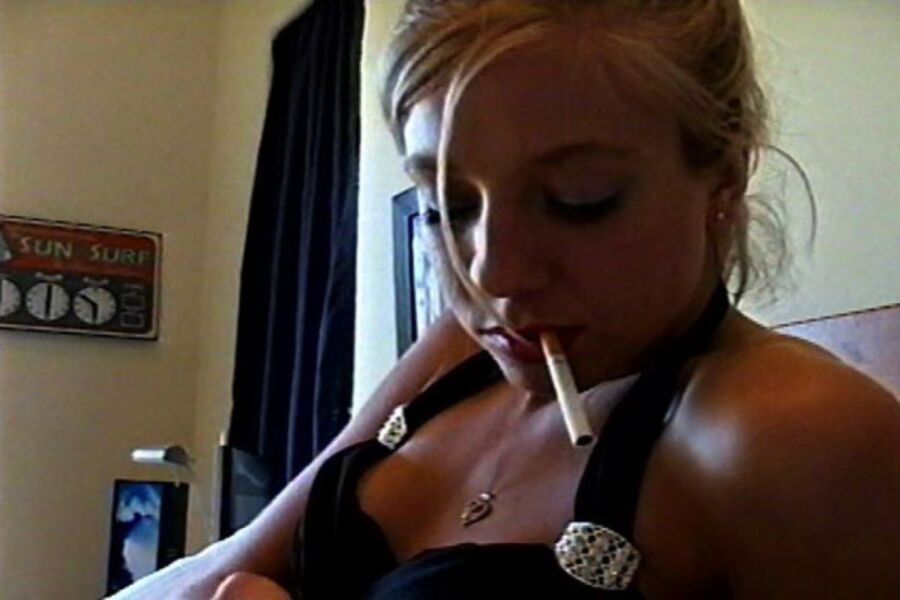 Free porn pics of here me on my bed having Marlboro red showing my pussy 18 of 28 pics
