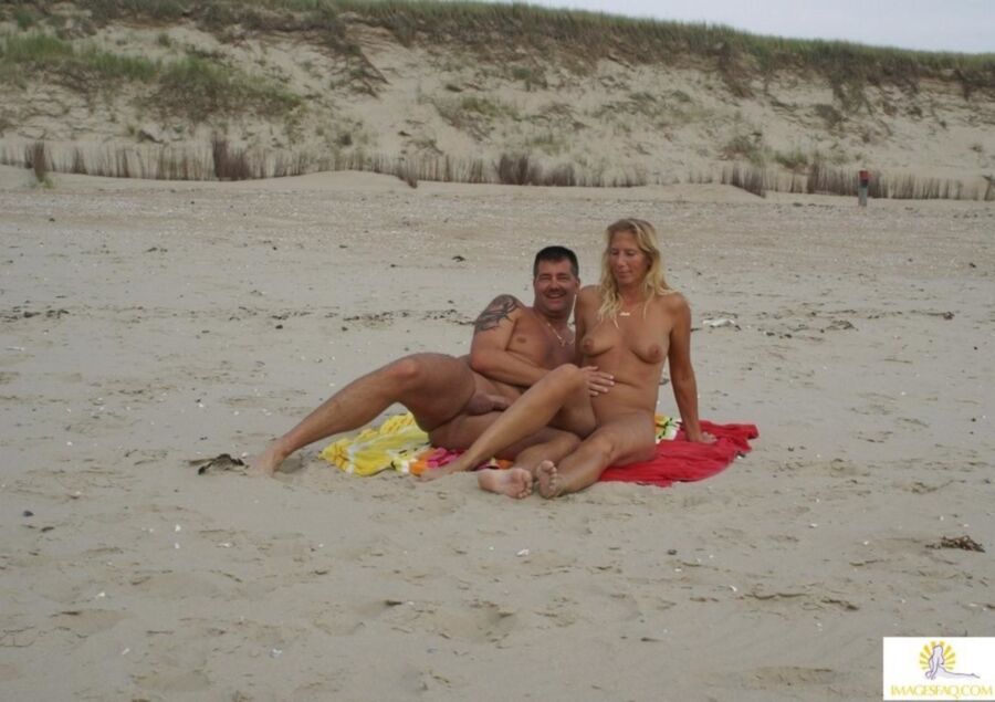 Free porn pics of Man with Wive @ Nude Beach 6 of 9 pics