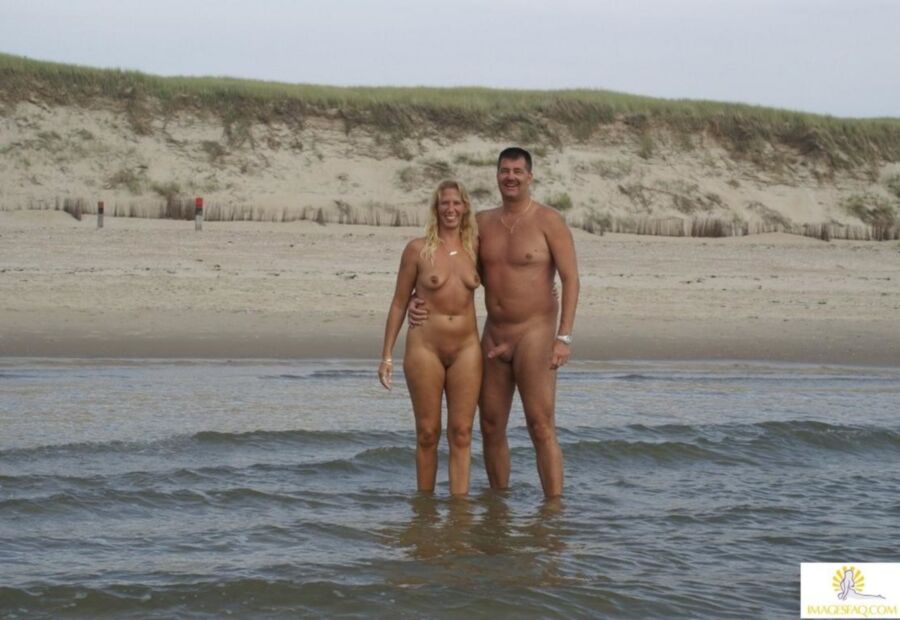Free porn pics of Man with Wive @ Nude Beach 9 of 9 pics