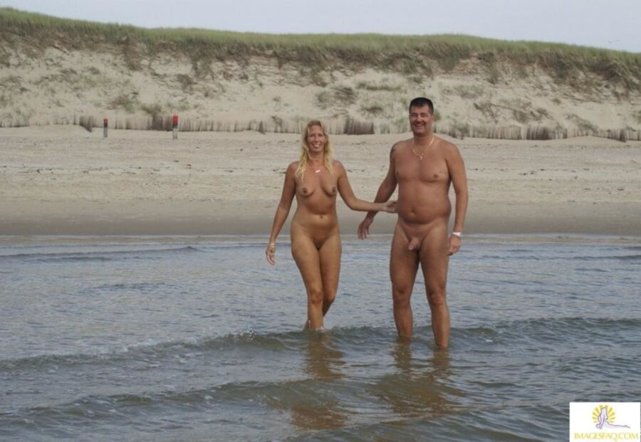 Free porn pics of Man with Wive @ Nude Beach 1 of 9 pics