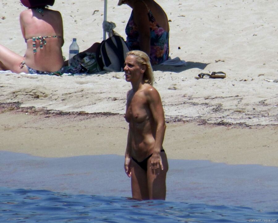 Free porn pics of Blonde MILF at the beach 19 of 50 pics